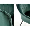 Chaise en velours vert foncé