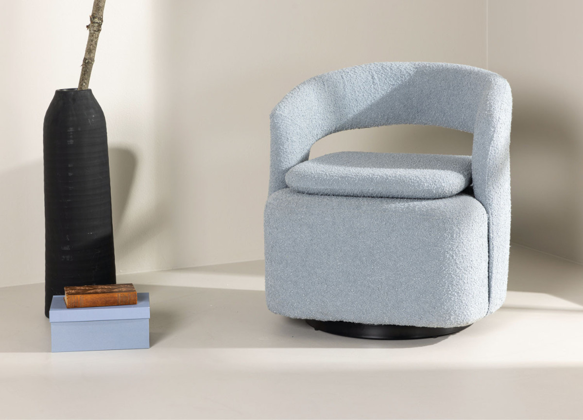 Fauteuil rotatif en tissu bouclé bleu clair