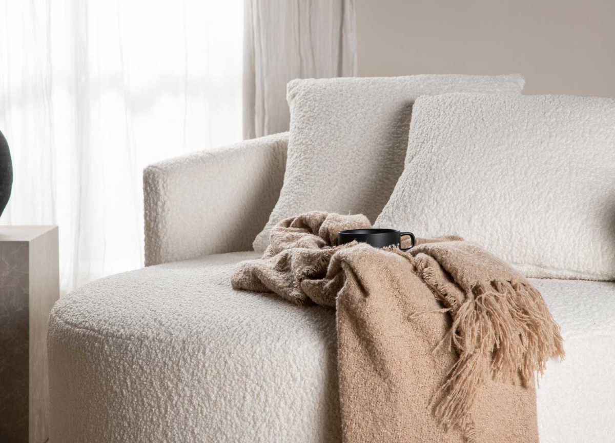 Canapé rond en tissu bouclé blanc