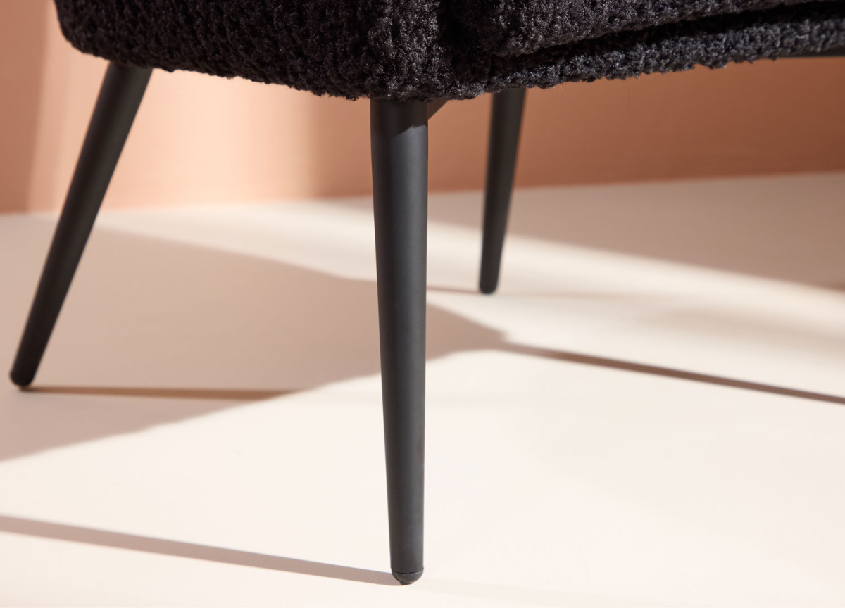 Fauteuil en tissu peluche noir tendance
