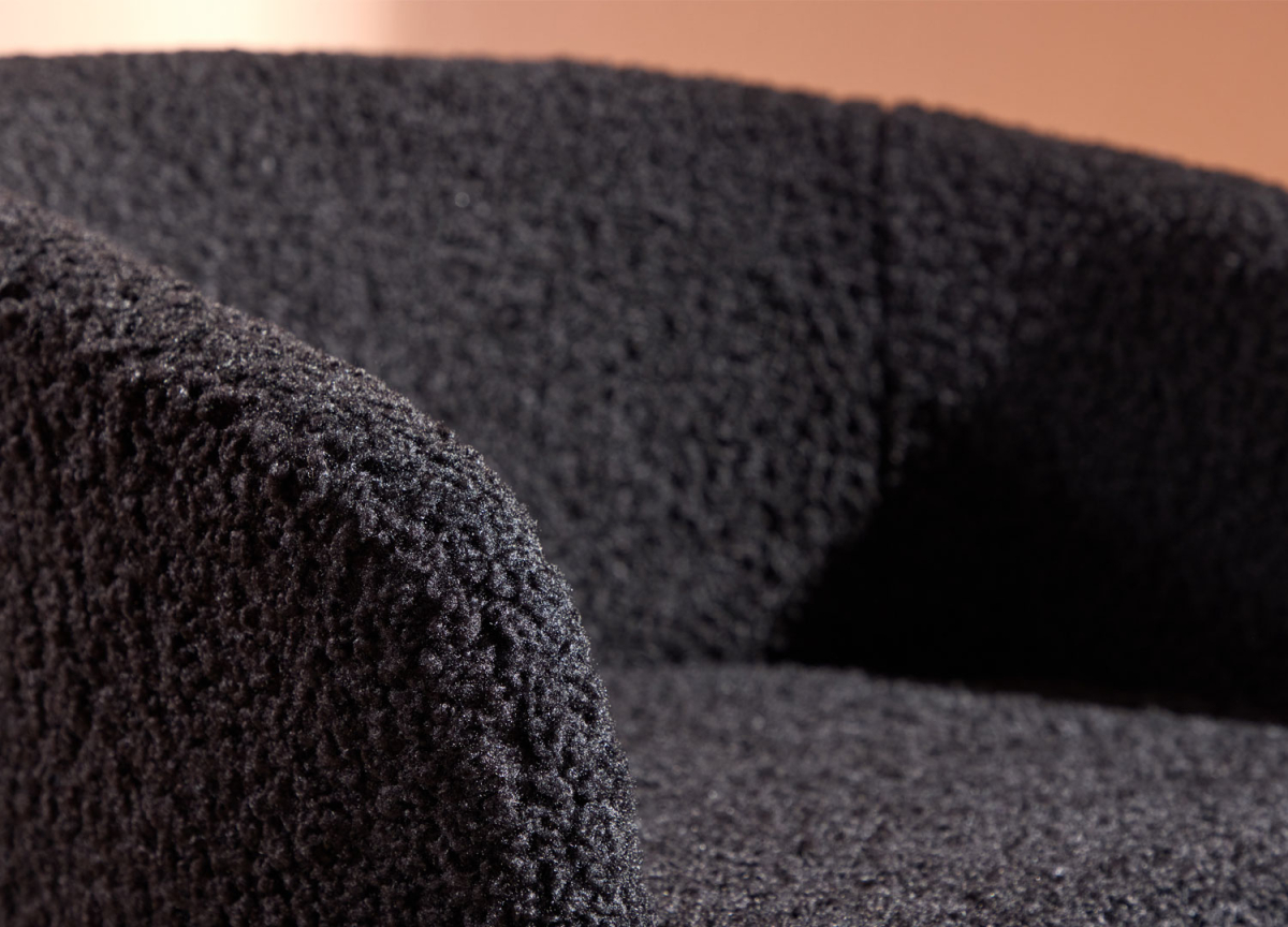 Fauteuil en tissu peluche noir tendance