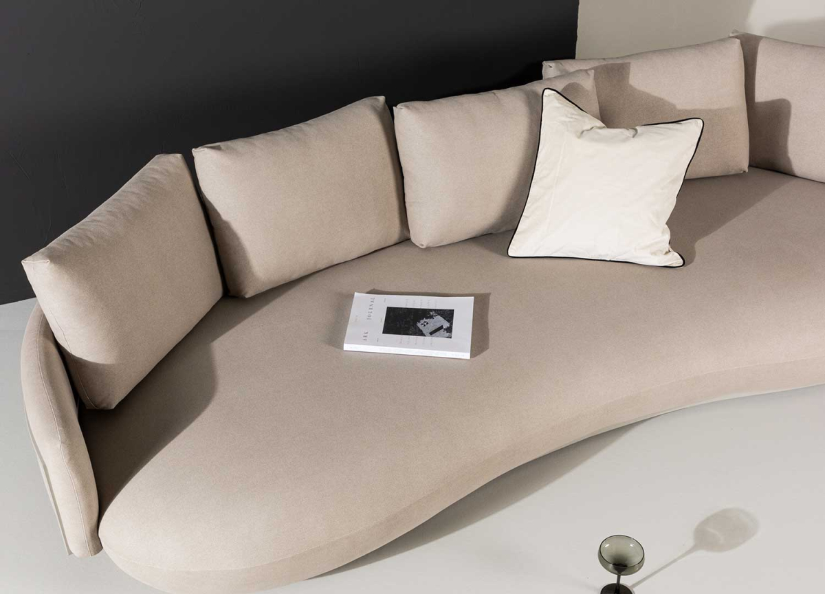 Canapé de salon design tissu beige forme haricot