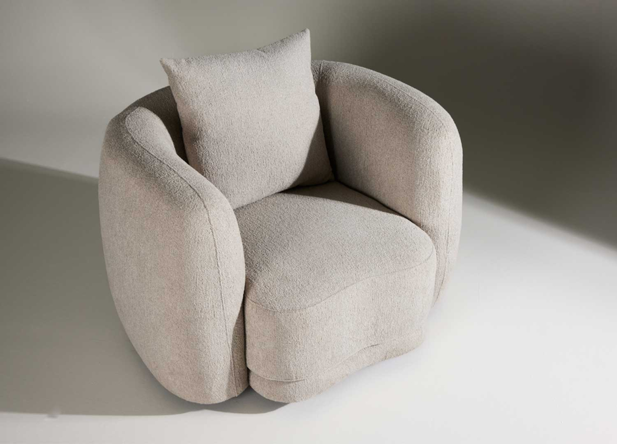 Fauteuil moderne en tissu bouclette beige