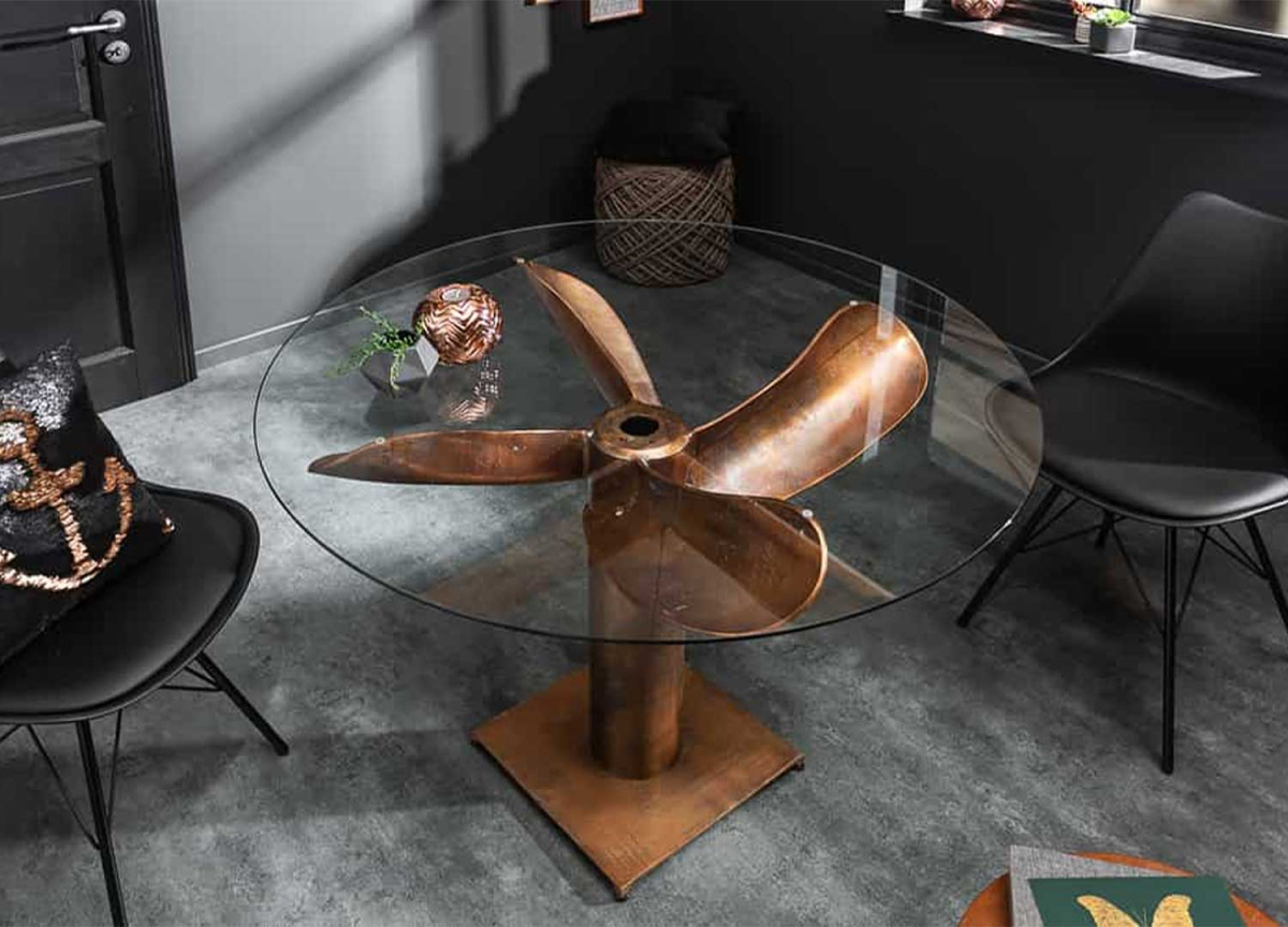Table salle à manger design pied hélice de bateau en cuivre plateau en verre rond 105 cm