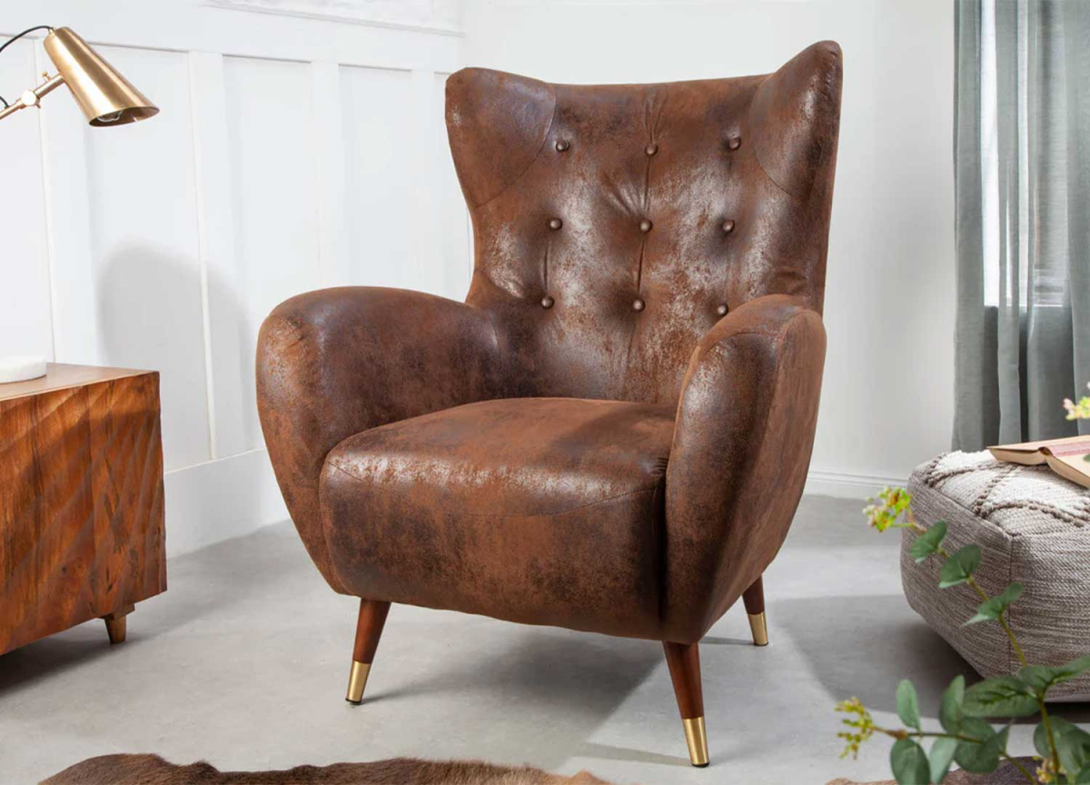 Fauteuil confortable en cuir marron vieilli