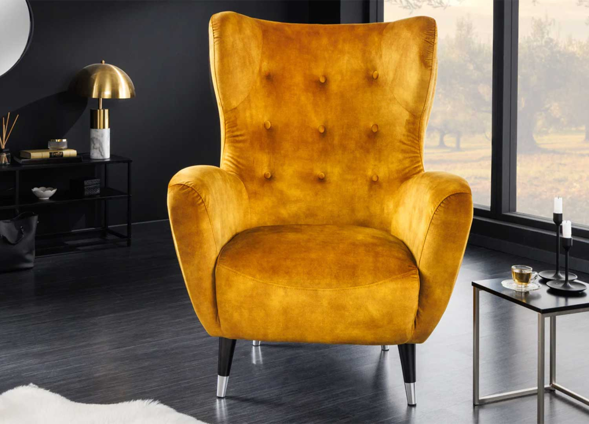 Fauteuil design a oreilles velours jaune moutarde