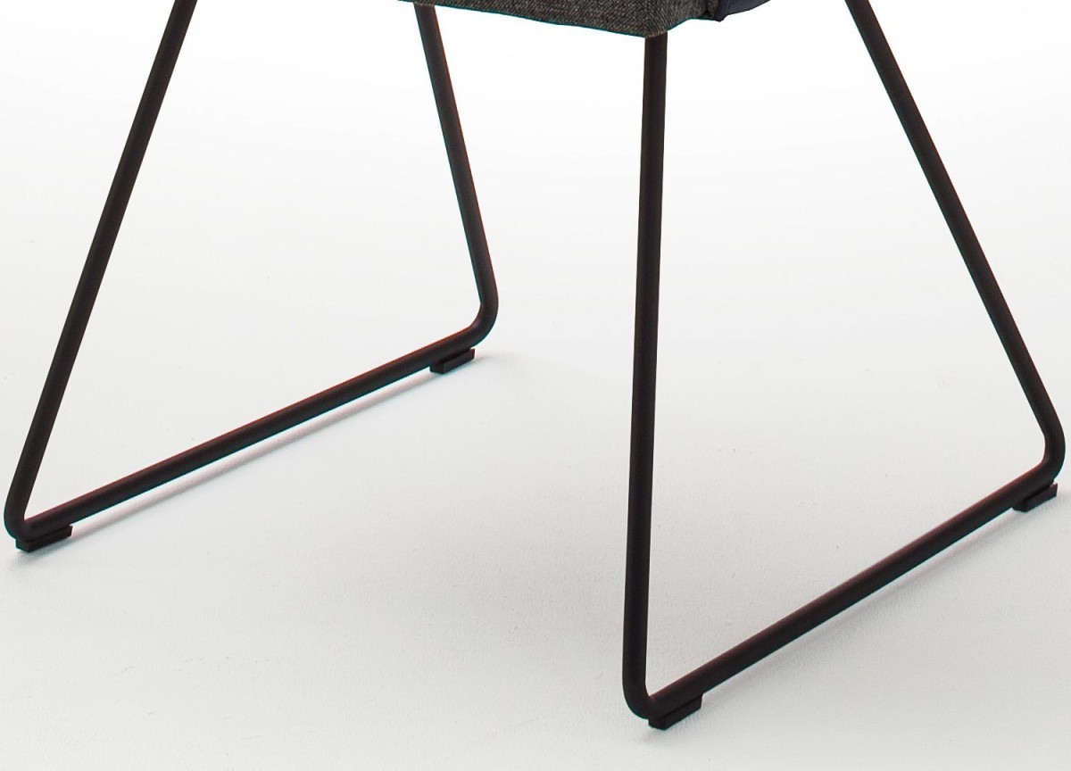 Chaise design capitonnée en tissu