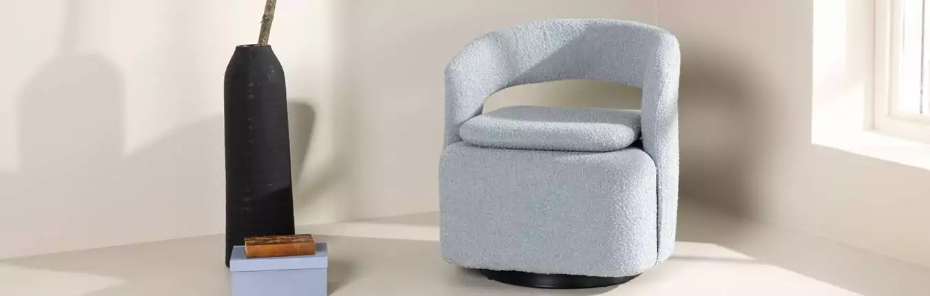 fauteuil rotatif en tissu bouclé bleu