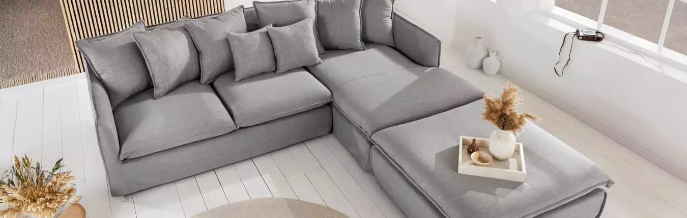 canapé d'angle en lin gris avec pouf en option