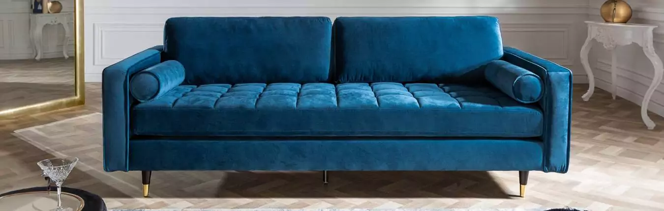 canapé rétro moderne en velours bleu